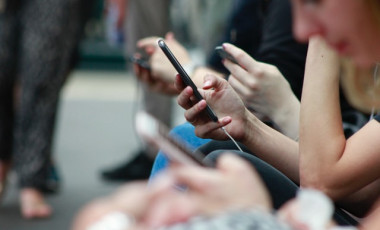 People browsing on cell phones at Bath, United Kingdom, Credits: Robin Worrall on Unsplash